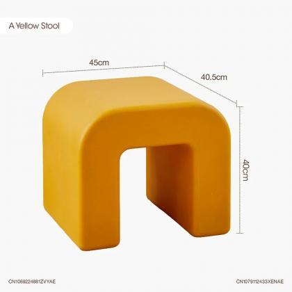 Modern Minimalist Yellow Side Table With Magazine..
