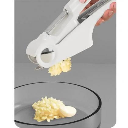 Sturdy Manual Garlic Press Crusher Kitchen Gadget..