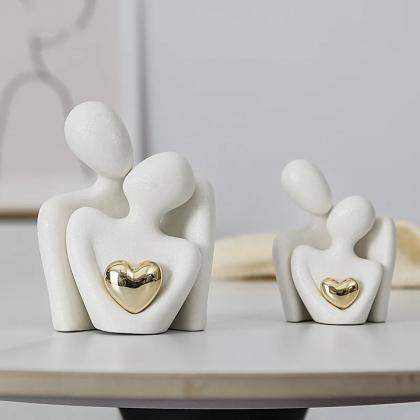 Abstract Loving Couple Sculptures With Golden..