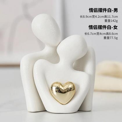 Abstract Loving Couple Sculptures With Golden..