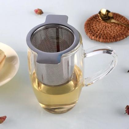 Glass Tea Mug With Integrated Stainless Steel..