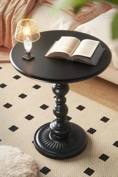 Elegant Round Black Pedestal Side Table With Turned Leg